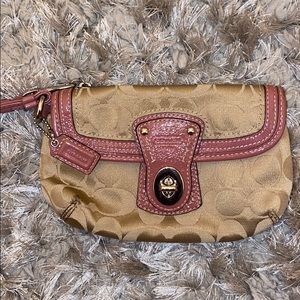 Brand new coach wristlet with lavender lining